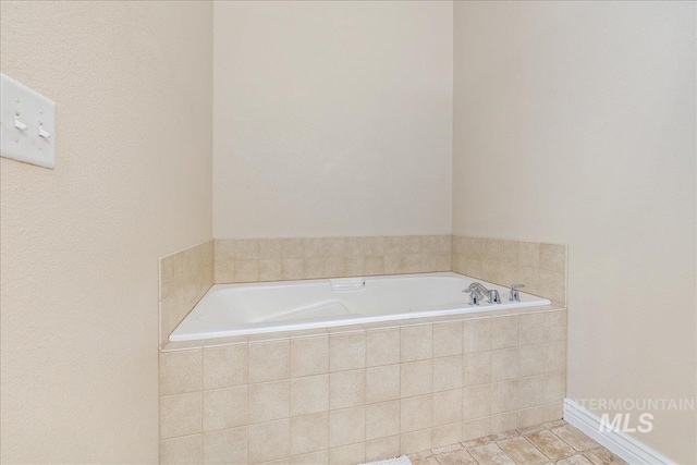 6229 S Snowdrop Way, Boise, ID 83716 - bathroom with a garden tub and tile patterned flooring