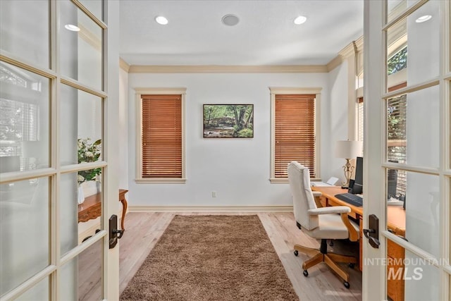 office space featuring crown molding, recessed lighting, french doors, and light wood finished floors