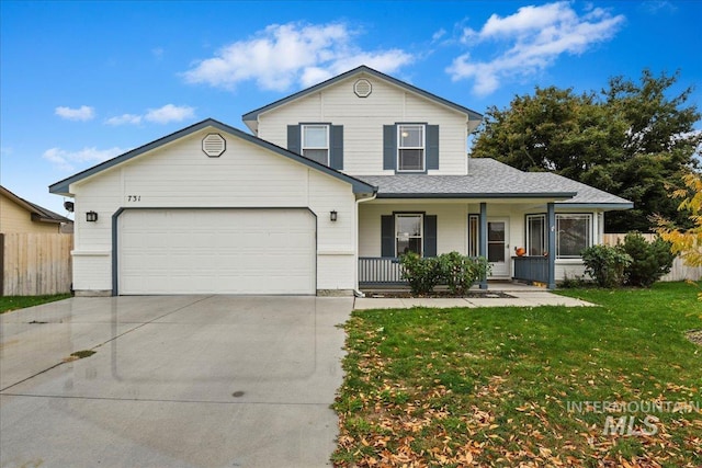 front of property with a front lawn, covered porch, and a garage