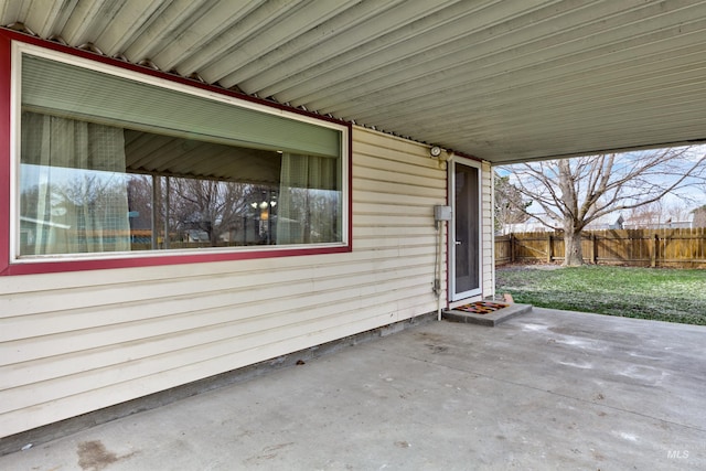 view of patio / terrace featuring fence