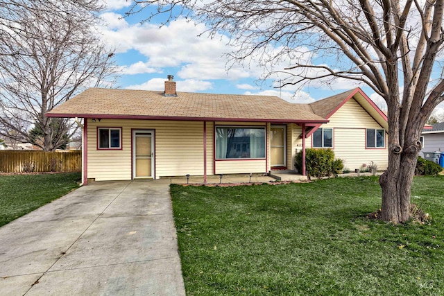 ranch-style home featuring a front lawn, fence, and a chimney