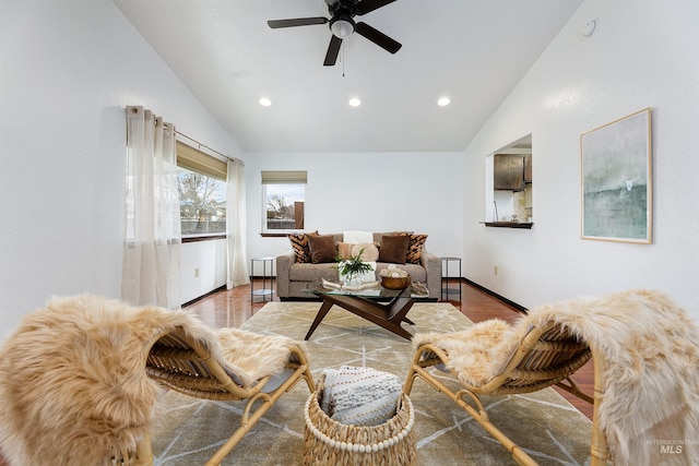 living room with a ceiling fan, recessed lighting, wood finished floors, and high vaulted ceiling