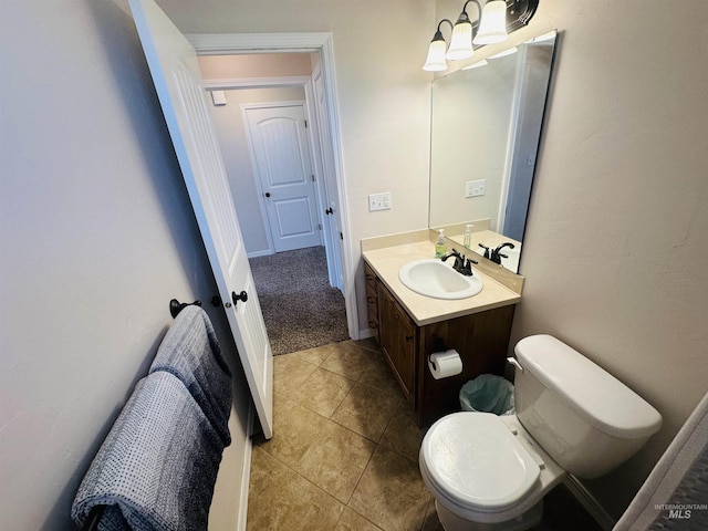 382 N 1020 E, Declo, ID 83323 - half bath with vanity, toilet, and tile patterned flooring