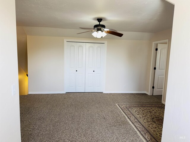 382 N 1020 E, Declo, ID 83323 - unfurnished bedroom with carpet flooring, a closet, baseboards, and a ceiling fan
