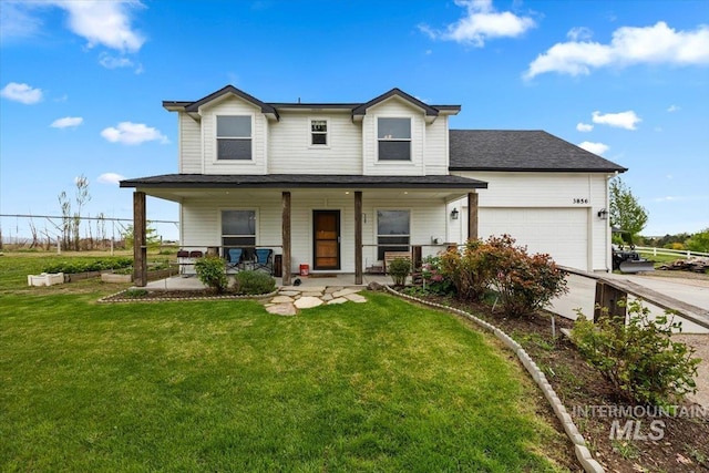 3856 Wood Way, New Plymouth, ID 83655 - traditional home with covered porch, an attached garage, driveway, and a front lawn