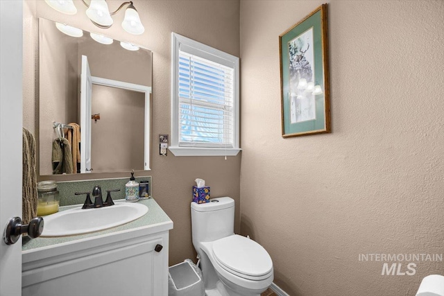 3856 Wood Way, New Plymouth, ID 83655 - bathroom featuring vanity and toilet