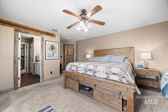3856 Wood Way, New Plymouth, ID 83655 - bedroom with visible vents, baseboards, ceiling fan, carpet flooring, and ensuite bath