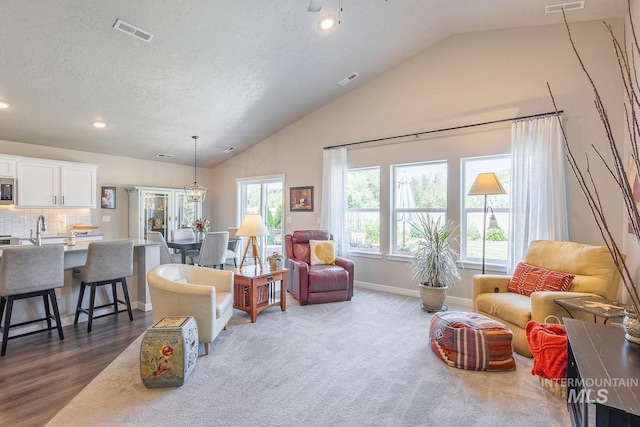 3772 S Walnut Ridge Way, Nampa, ID 83686 - living area with recessed lighting, a textured ceiling, and high vaulted ceiling