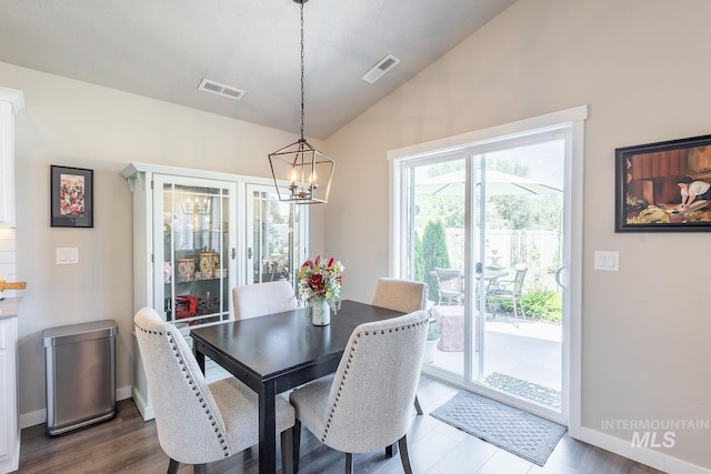 3772 S Walnut Ridge Way, Nampa, ID 83686 - dining space with a chandelier, lofted ceiling, and dark wood-type flooring