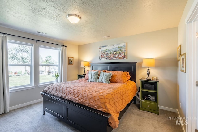 3772 S Walnut Ridge Way, Nampa, ID 83686 - bedroom featuring light colored carpet and a textured ceiling