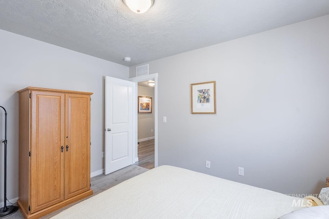 3772 S Walnut Ridge Way, Nampa, ID 83686 - bedroom with baseboards and a textured ceiling