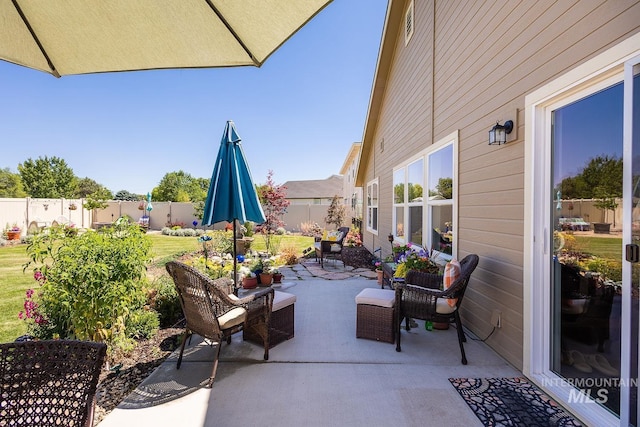 3772 S Walnut Ridge Way, Nampa, ID 83686 - fenced backyard featuring a patio
