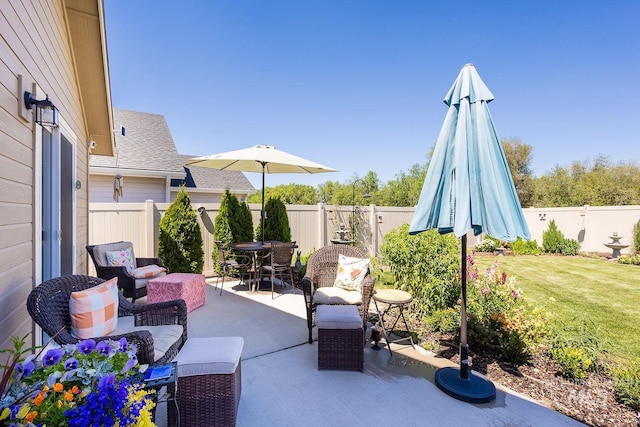 3772 S Walnut Ridge Way, Nampa, ID 83686 - fenced backyard featuring a patio, an outdoor living space, and outdoor dining area