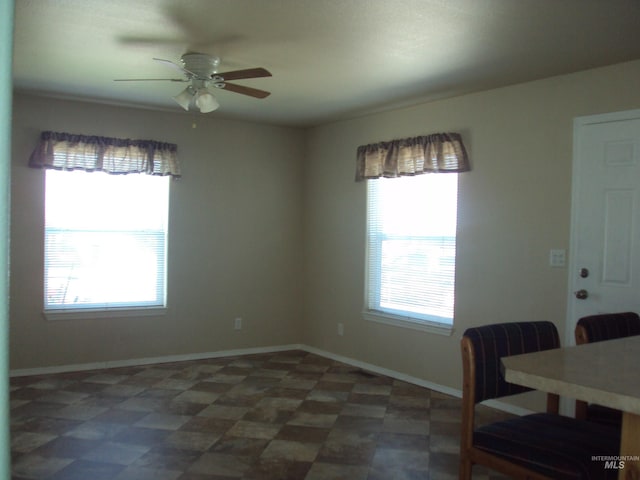 908 Pine St, Lewiston, ID 83501 - unfurnished dining area featuring plenty of natural light, tile patterned floors, ceiling fan, and baseboards