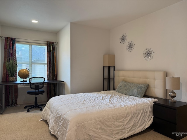 bedroom featuring recessed lighting and carpet floors