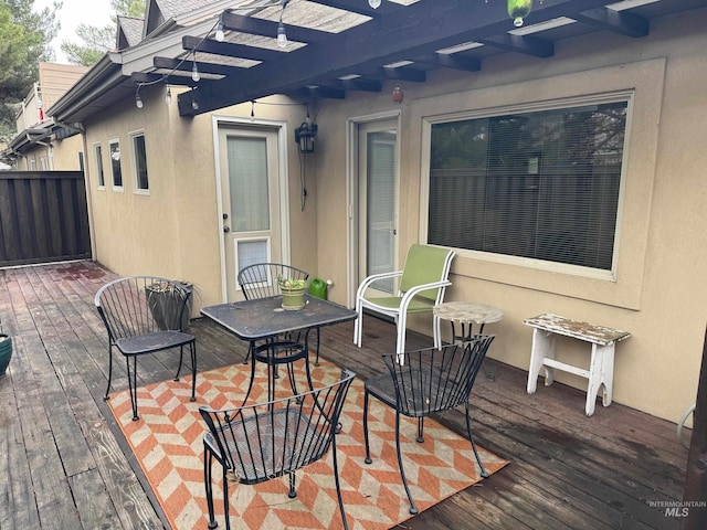 wooden deck with a pergola