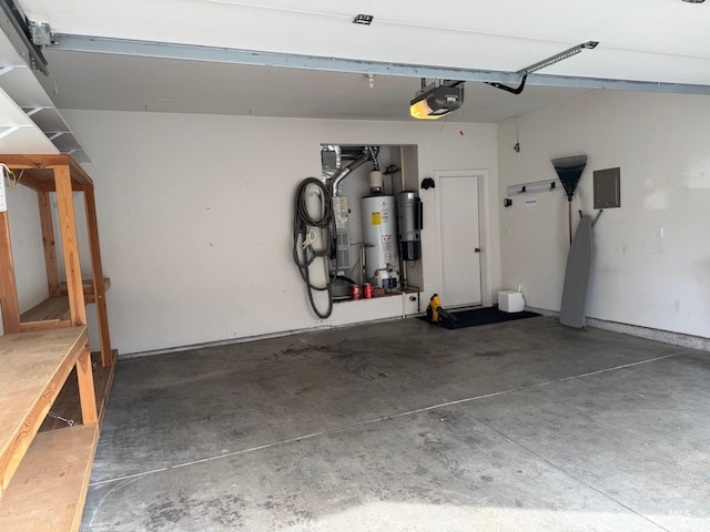 garage featuring electric panel, a garage door opener, and water heater