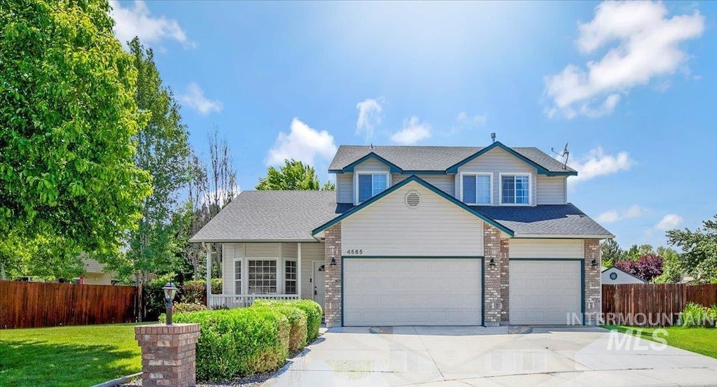 4565 N Newburgh Pl, Boise, ID 83713 - traditional-style home featuring concrete driveway and a garage
