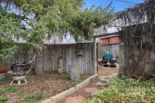 view of outdoor structure with a fenced backyard