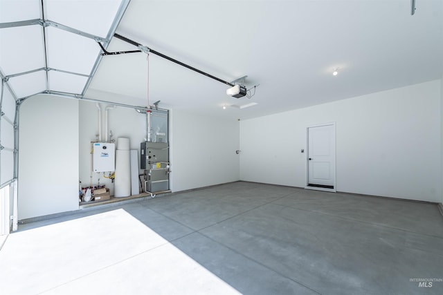 garage with heating unit, water heater, and a garage door opener