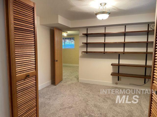 10809 W Cruser, Boise, ID 83709 - interior space with light colored carpet