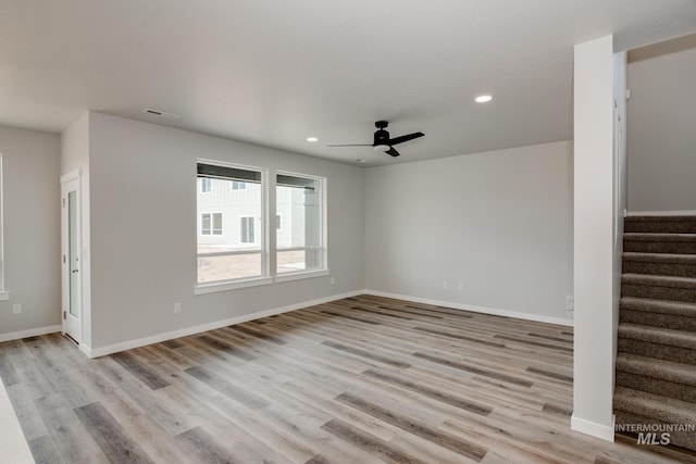 unfurnished room with light hardwood / wood-style floors and ceiling fan