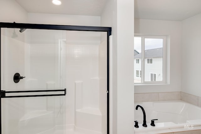 bathroom with independent shower and bath