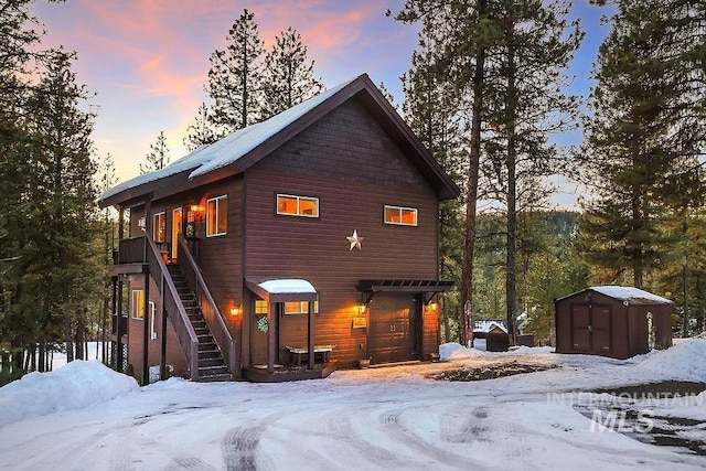 exterior space with a shed