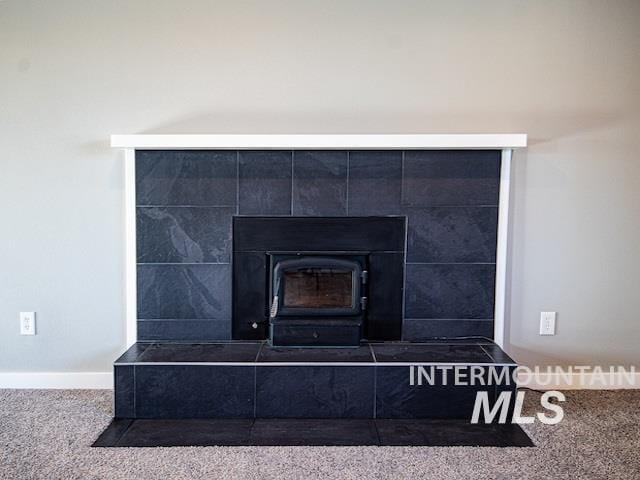 detailed view of carpet floors and baseboards