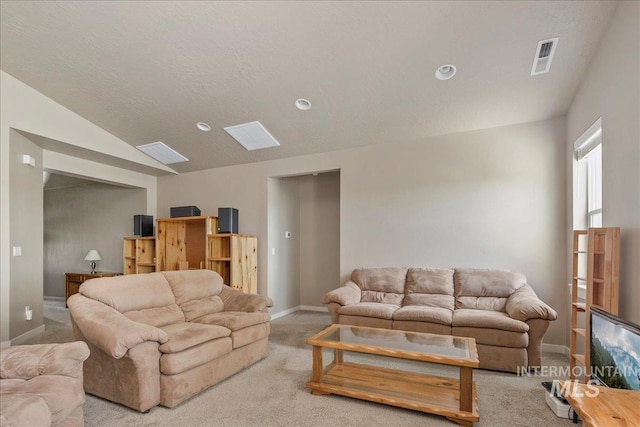 2510 Duchess Trl, Emmett, ID 83617 - carpeted living room with lofted ceiling, baseboards, and recessed lighting