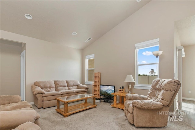 2510 Duchess Trl, Emmett, ID 83617 - living area featuring light colored carpet, high vaulted ceiling, and baseboards
