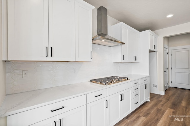 6117 N Torva Ave, Meridian, ID 83646 - kitchen with wall chimney exhaust hood, stainless steel gas stovetop, white cabinets, dark wood finished floors, and backsplash