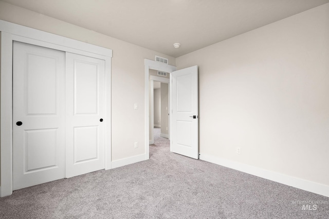 6117 N Torva Ave, Meridian, ID 83646 - unfurnished bedroom featuring carpet, baseboards, and a closet