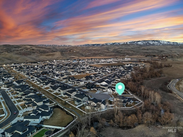 bird's eye view with a residential view and a mountain view