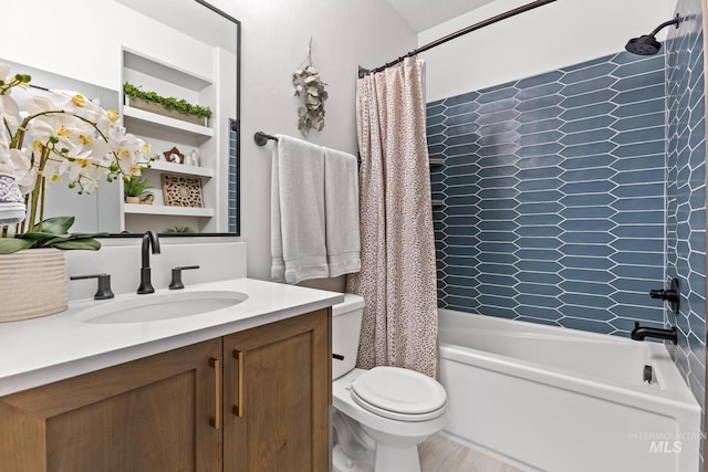 full bathroom with toilet, shower / tub combo with curtain, and vanity