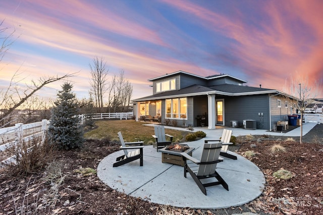 back of house with an outdoor fire pit, cooling unit, a patio, and fence