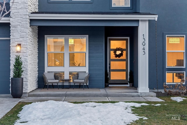 property entrance featuring covered porch