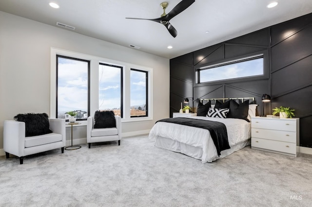 carpeted bedroom featuring ceiling fan