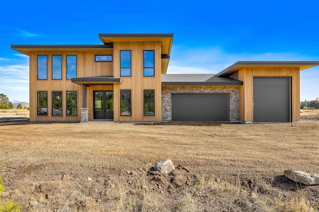 modern home featuring a garage