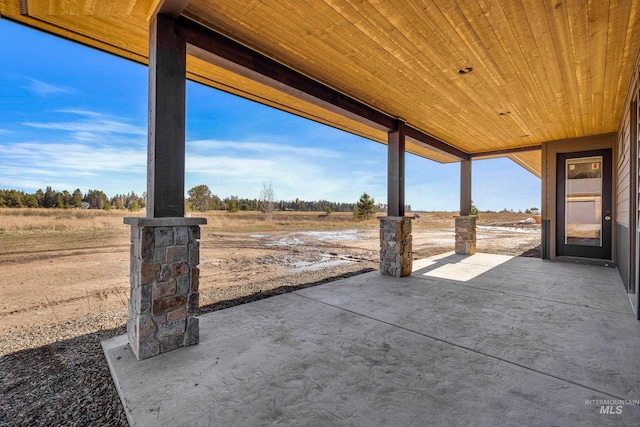 view of patio / terrace with a rural view