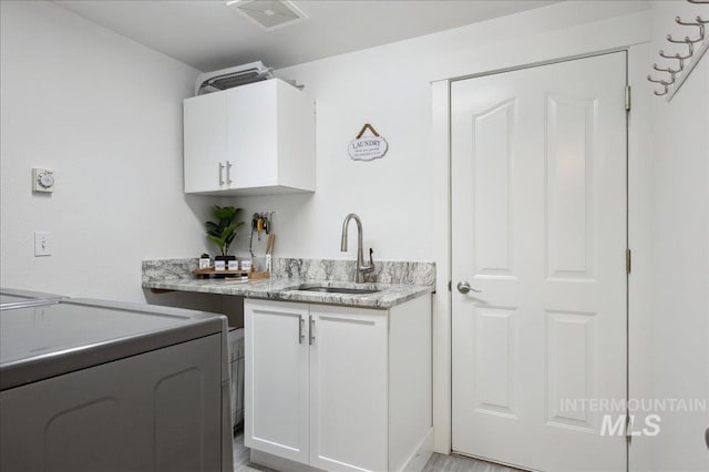 5322 N Papago Pl, Boise, ID 83713 - laundry area with washer / dryer and cabinet space