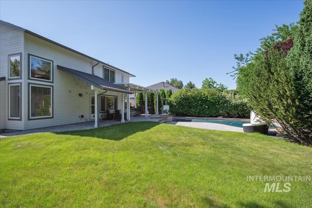 5322 N Papago Pl, Boise, ID 83713 - view of grassy yard featuring a patio area