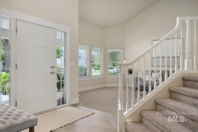 5322 N Papago Pl, Boise, ID 83713 - entryway with stairway, high vaulted ceiling, and wood finished floors