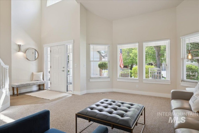 5322 N Papago Pl, Boise, ID 83713 - carpeted living area with high vaulted ceiling and baseboards