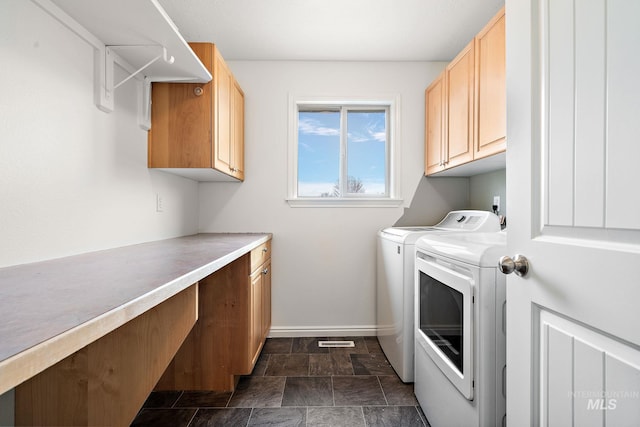 1452 E Pistioa, Meridian, ID 83642 - washroom featuring baseboards, washer and clothes dryer, cabinet space, and stone finish floor