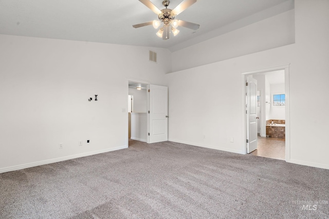1452 E Pistioa, Meridian, ID 83642 - unfurnished bedroom with baseboards, visible vents, vaulted ceiling, and carpet