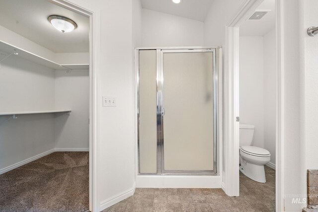 1452 E Pistioa, Meridian, ID 83642 - bathroom with toilet, visible vents, a walk in closet, and a stall shower