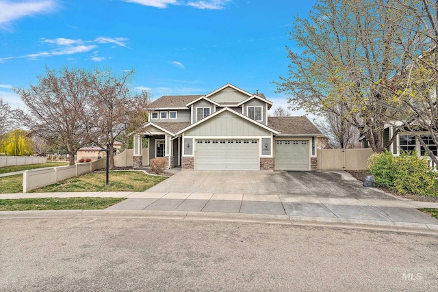 1452 E Pistioa, Meridian, ID 83642 - craftsman house with fence, brick siding, board and batten siding, an attached garage, and driveway