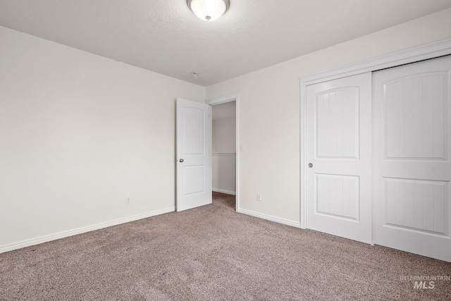 1452 E Pistioa, Meridian, ID 83642 - unfurnished bedroom with baseboards, carpet, and a closet