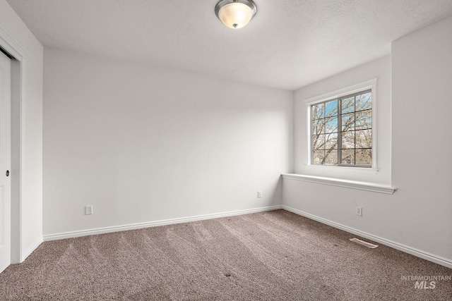 1452 E Pistioa, Meridian, ID 83642 - empty room featuring baseboards, visible vents, and carpet